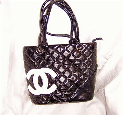 black chanel bag white logo|chanel purses black original.